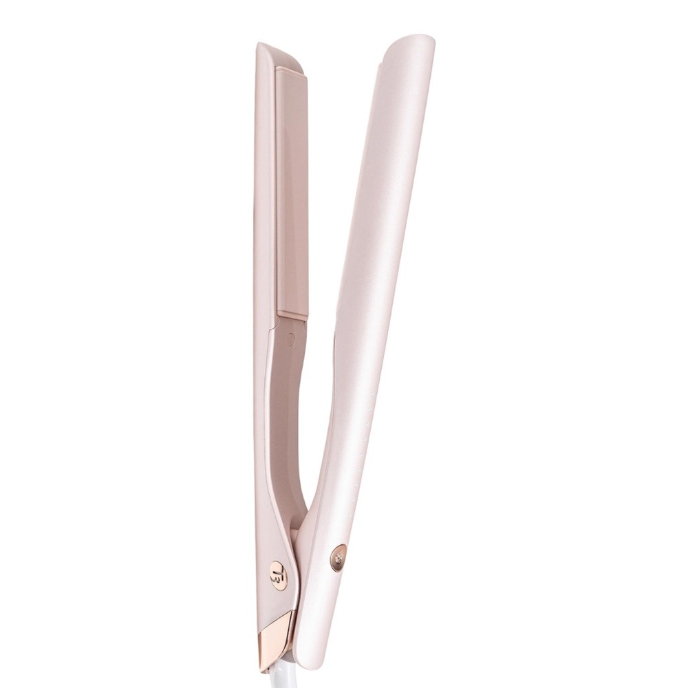 t3 flat iron/ with box used 3 times. Selling because I cut my hair to short